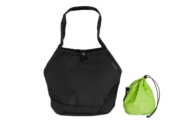 A Swift in Black Ballistic with Kiwi (bright green with white grid) 200 Halcyon interior and Yarn Stuff Sack.